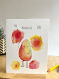 Card with a cartoon mango character and watercolor sun bursts on a white background. Mei pie studio greeting cards