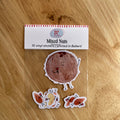 Sticker set with a 'Mixed Nuts' packaging on a wooden surface