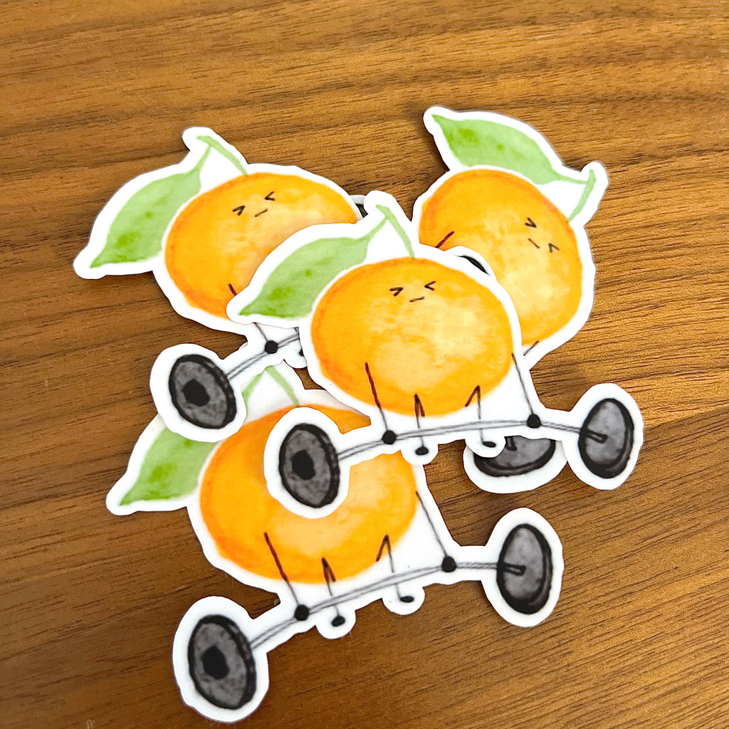 pile of Die-cut vinyl stickers of ambitious 