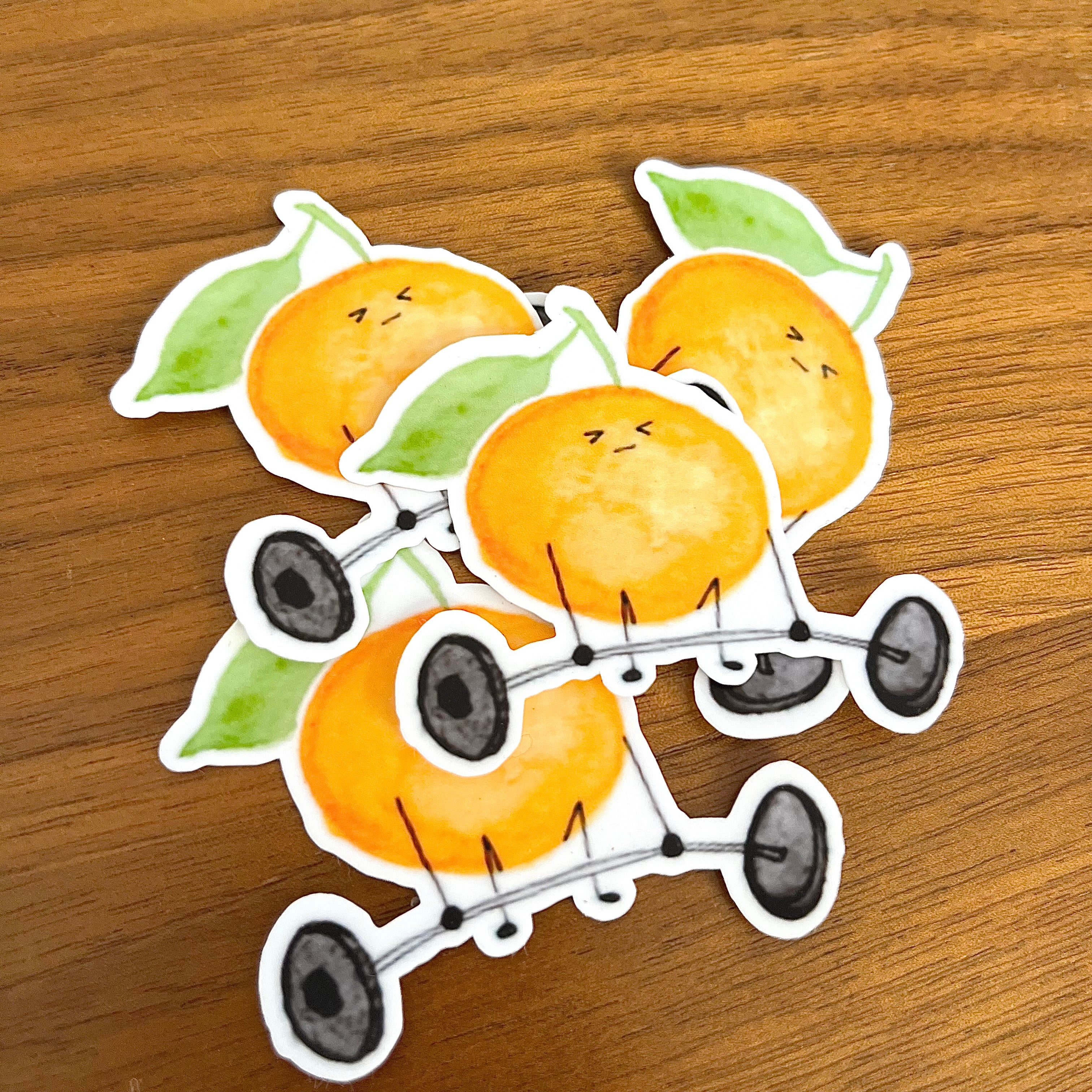 pile of Die-cut vinyl stickers of ambitious 