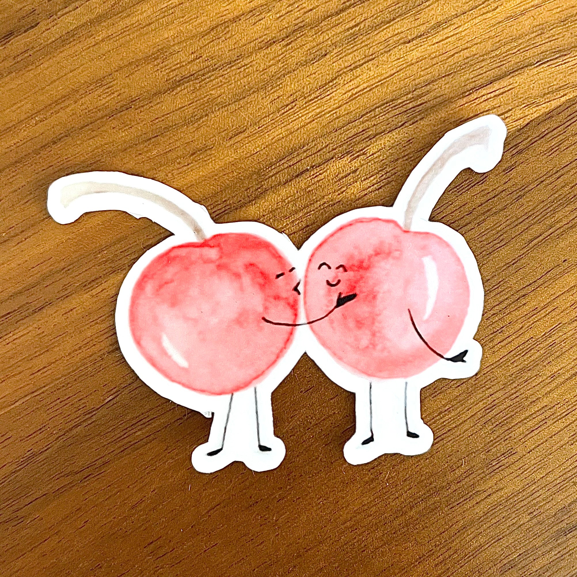 Die-cut vinyl stickers of cherries kissing. I cherry-ish you