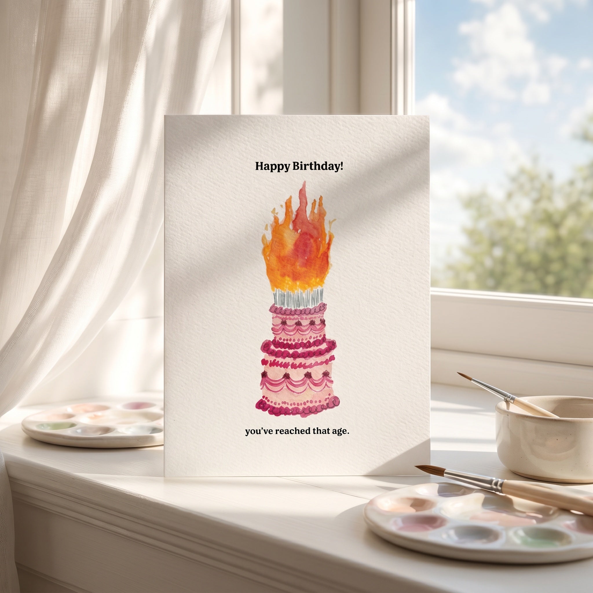 Birthday card with cake illustration on a windowsill with a view of trees