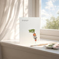 Note card with a carrot character and 'You Kick Butt' text on a windowsill.