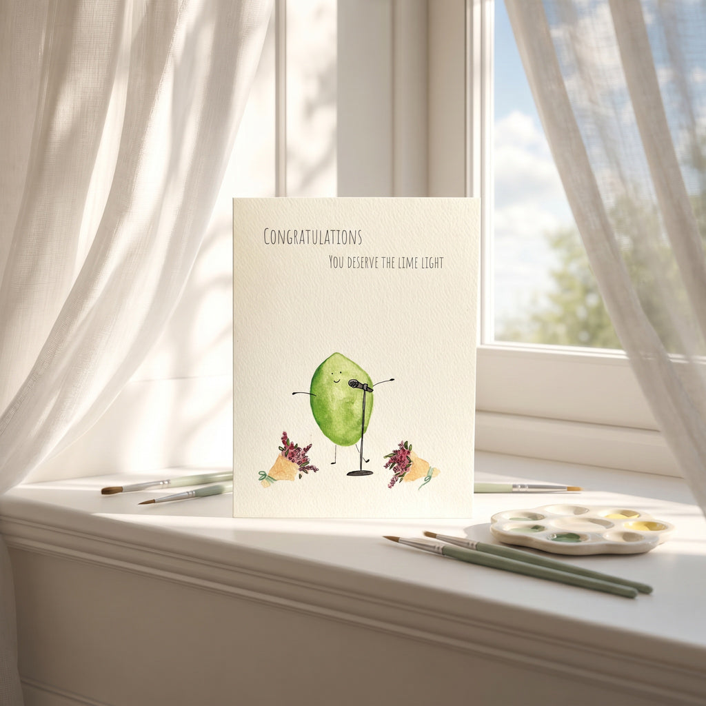 Greeting card with lime illustration on a windowsill with art supplies