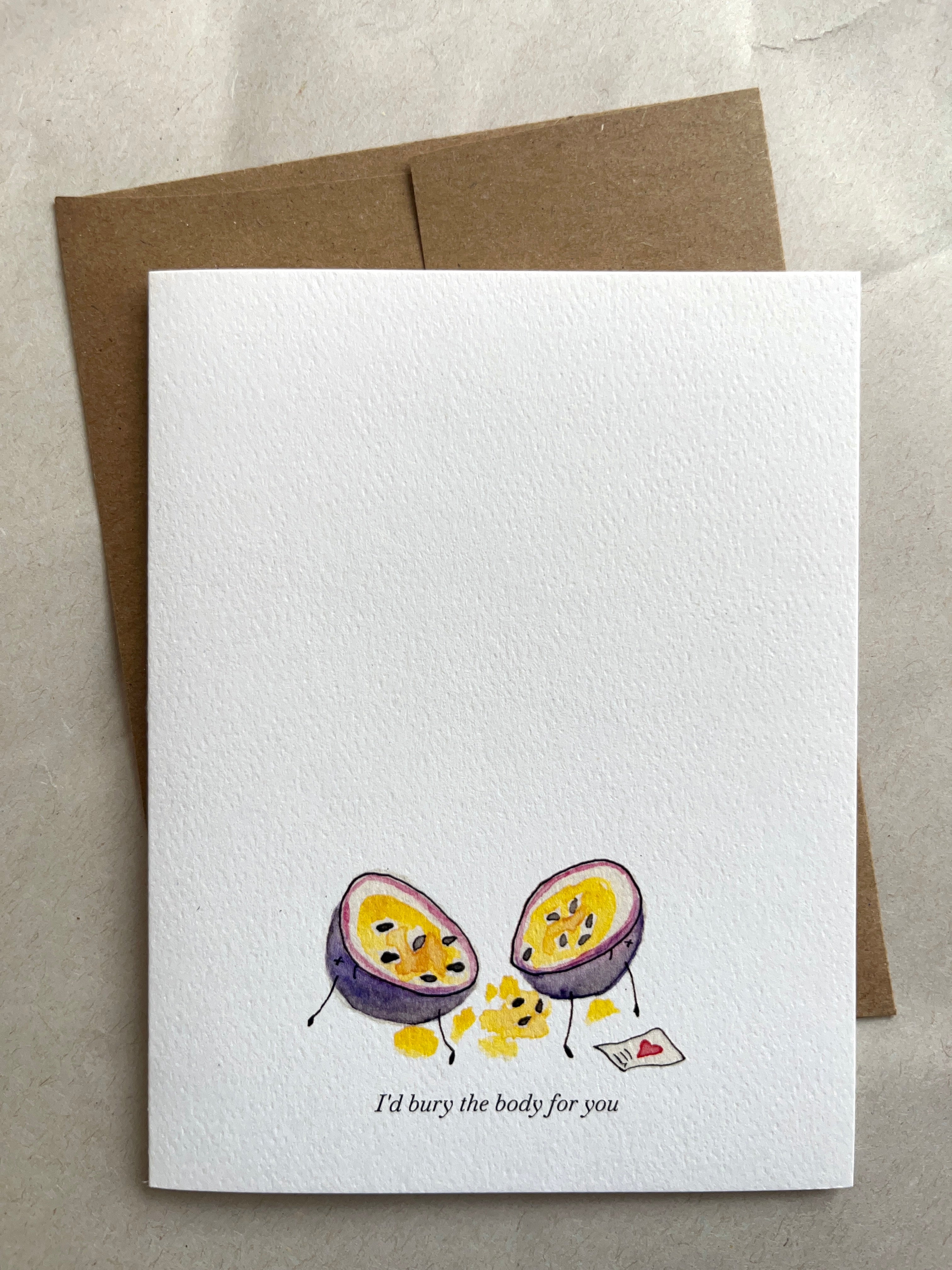 Greeting card with a humorous illustration of two passion fruits and a brown envelope on a textured surface. I'd bury the body for you