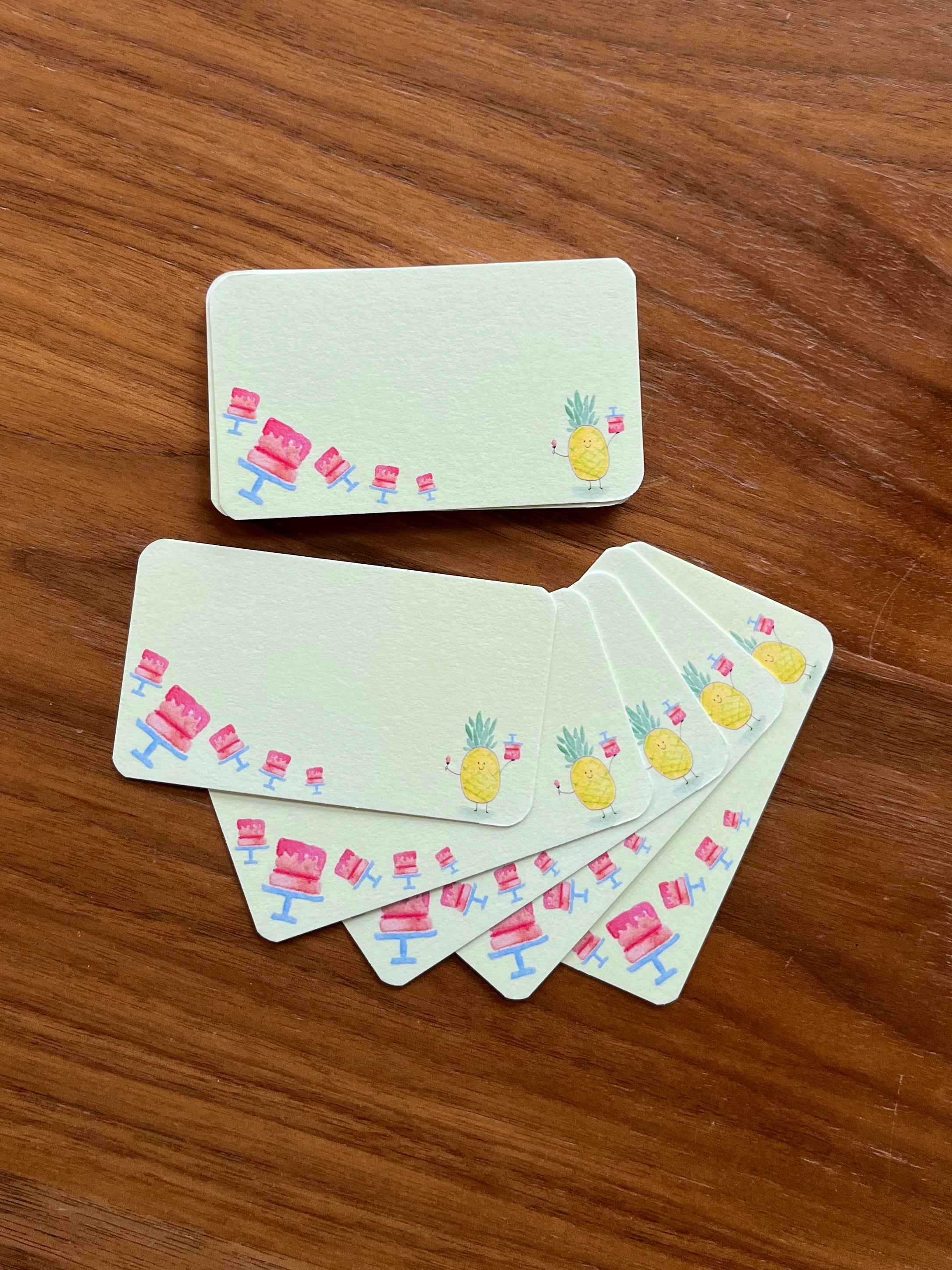 mei pie studio minimalist watercolor happy birthday mini note set  on classic crest neenah stock. featuring a pineapple and pink cakes. great for gift tags